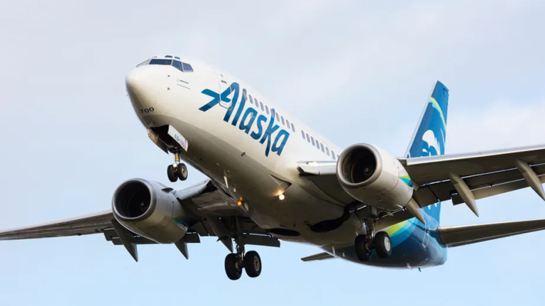 Woman climbs onto wing of Alaska Airlines plane at Seattle airport due to ‘anxiety’