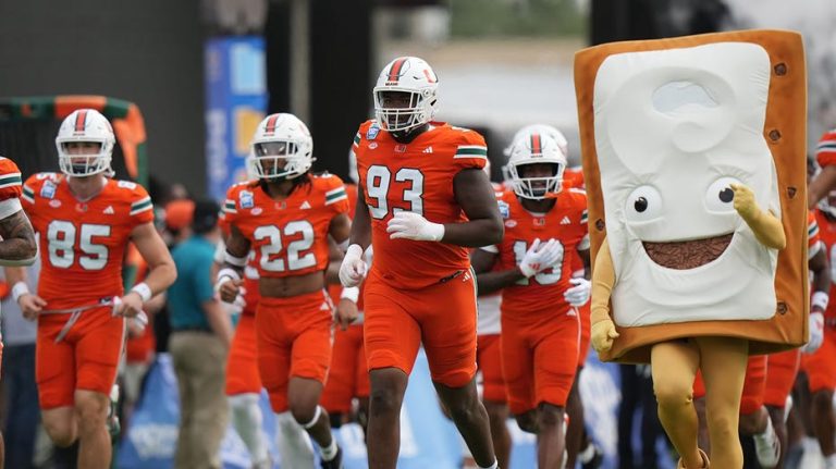 Miami teammates fight on sideline during Pop-Tarts Bowl