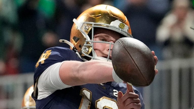 Notre Dame’s Riley Leonard points to favorite Bible verse after scoring opening TD in national title game